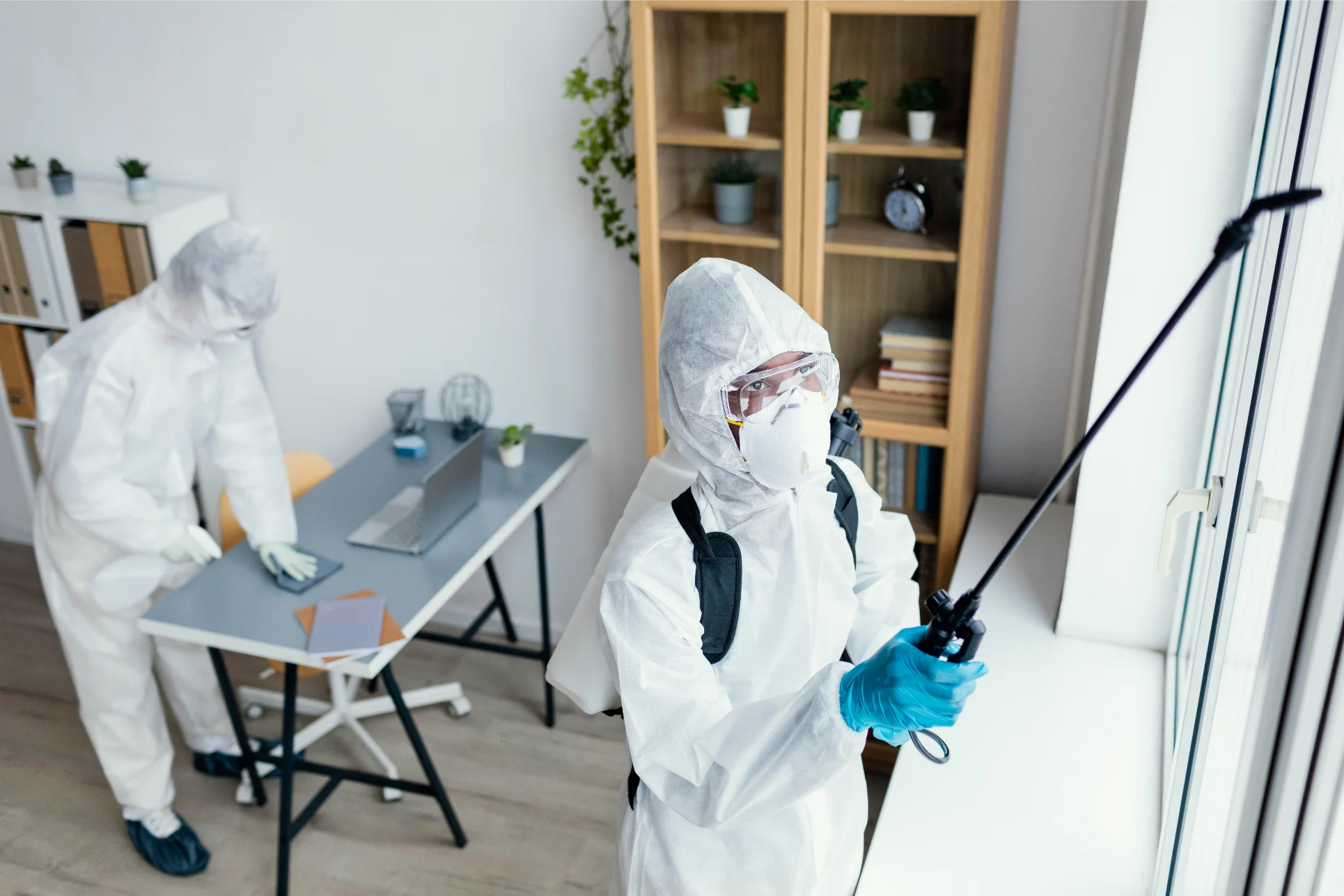 Mold remediation specialist in protective gear